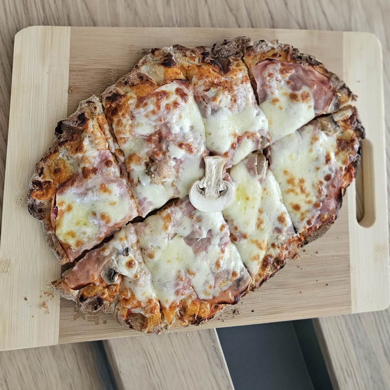 Prosciutto e funghi